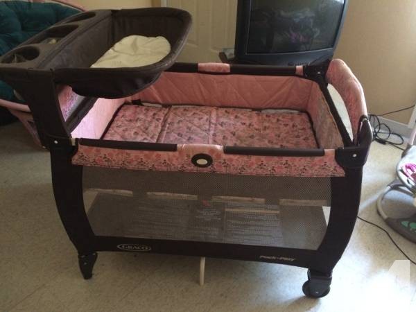 pink pack n play bassinet