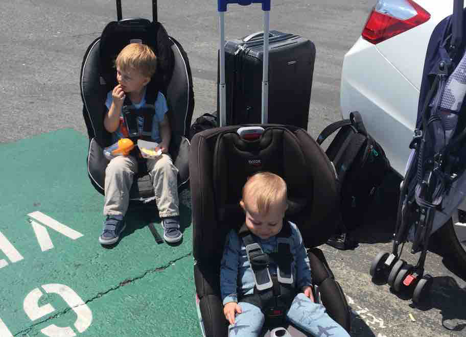toddlers in rolling car seats